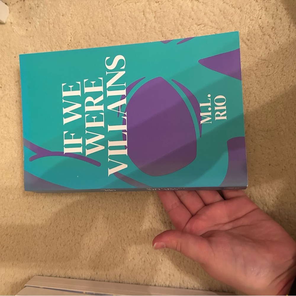 Teal and Purple Book by M.L. Rio
